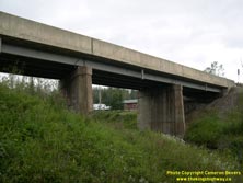 HWY 17 #1085 - © Cameron Bevers: An angled side view of the steel girder bridge over Stillwater Creek on Hwy 11 and Hwy 17